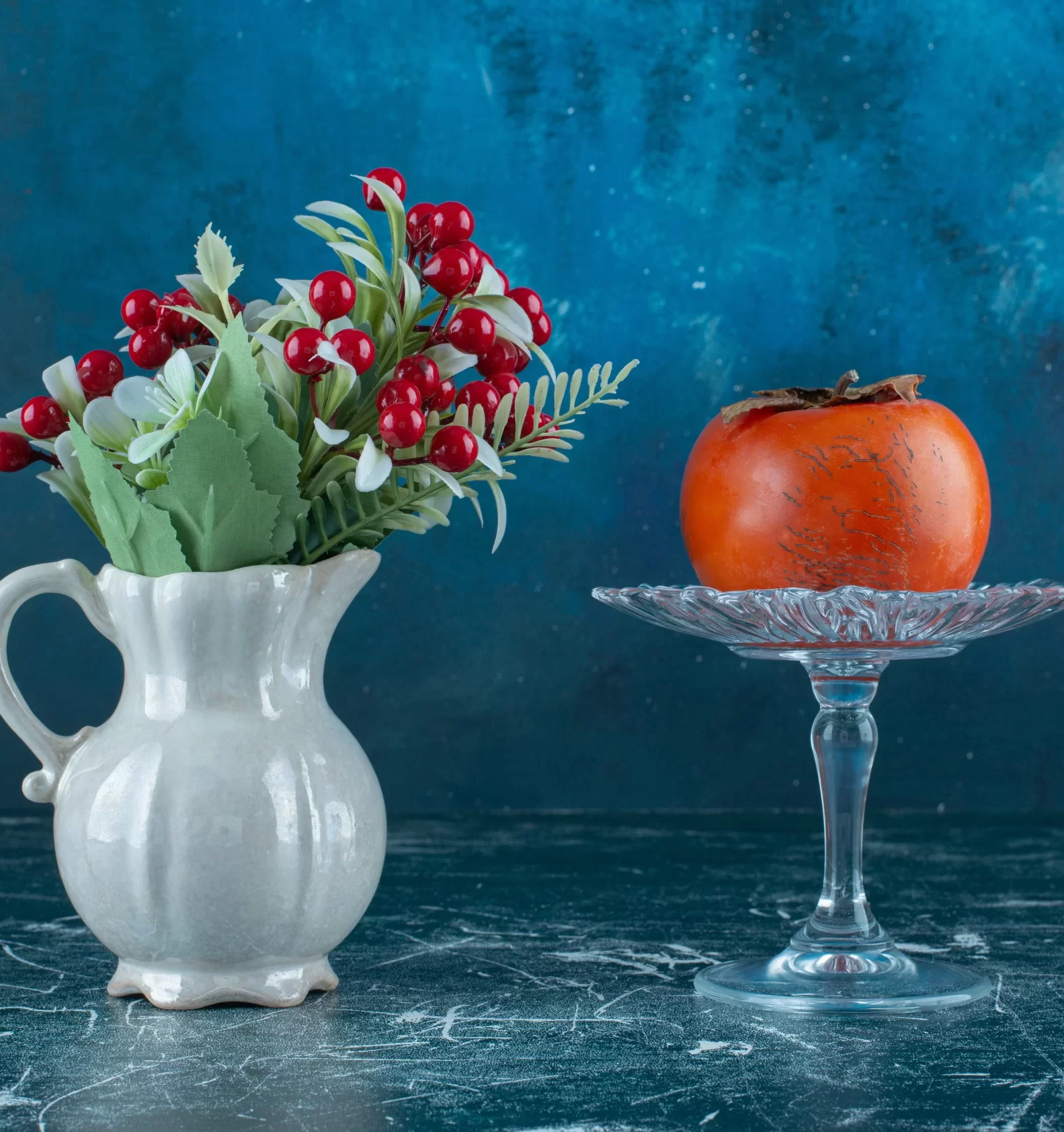 Tasty persimmon and a vase